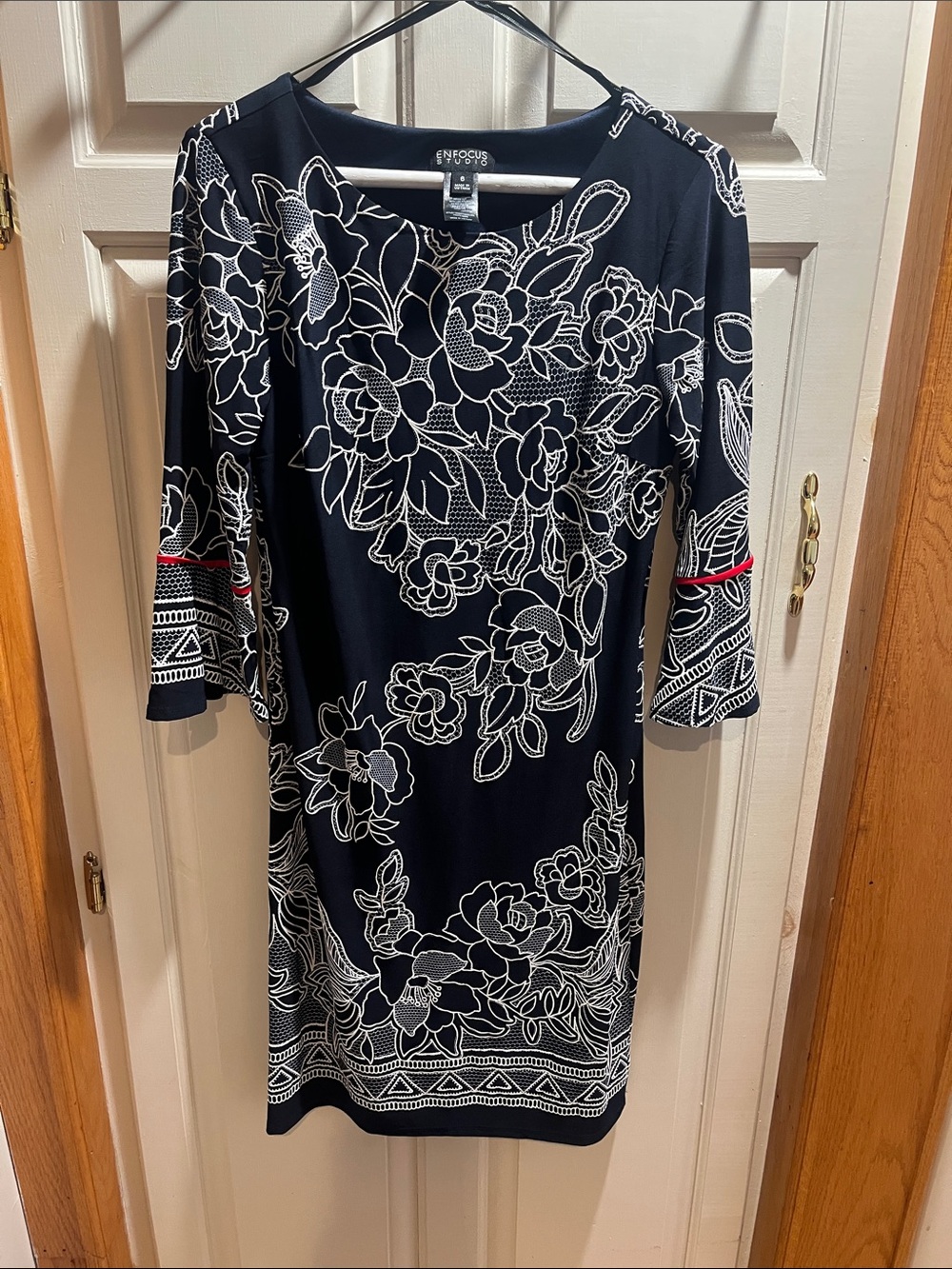 Enfocus Studio Navy Dress with White Floral Outline and Red Accent